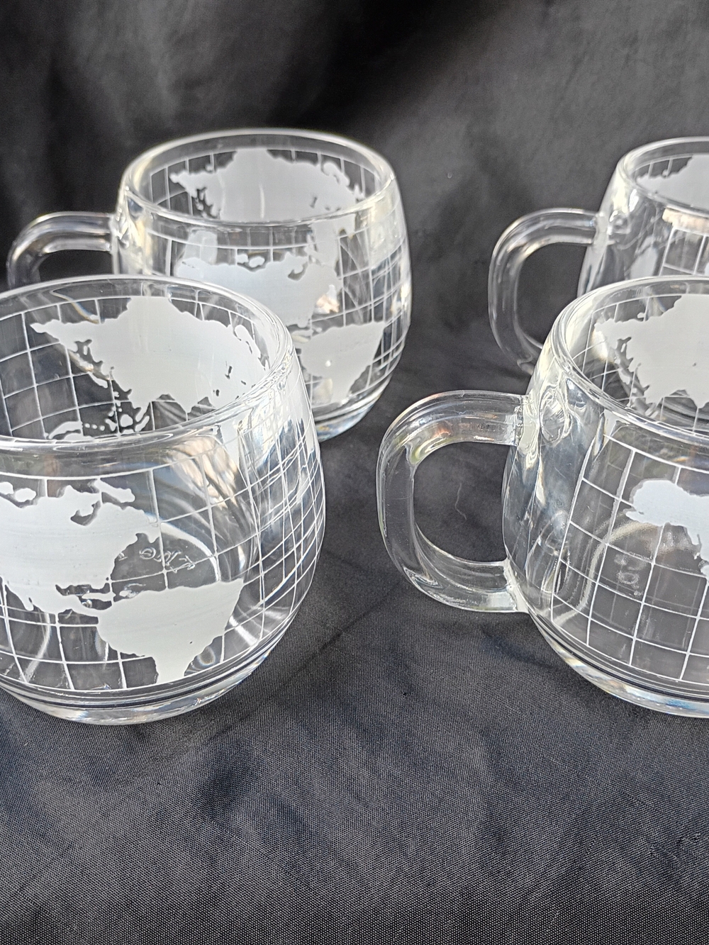 Set of Four (4) Nestle Glass World Globe Mugs